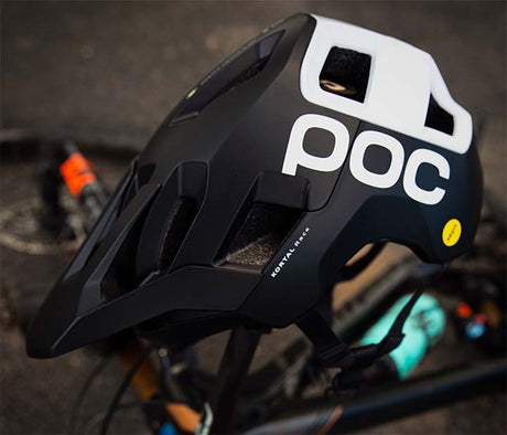 POC Kortal Race Mips mountain bike helmet and tectal on a service bench